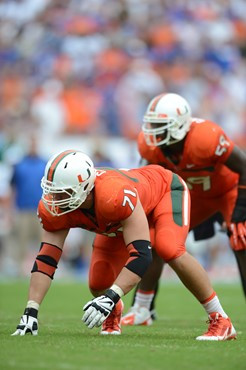 University of Miami Hurricanes defensive lineman Anthony Chickillo #71 plays in a game against the #12 ranked University of Florida Gators at Sun Life...