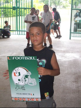 A young Miami Hurricanes fan shows spirit
