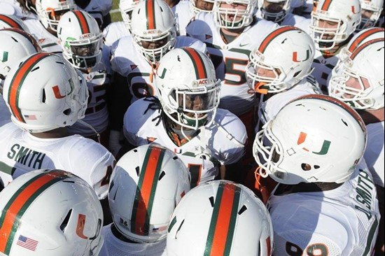 2011 Miami Hurricanes Football @ Florida State. Sean Sepnce huddle & helmets by J.C. CaneShooter Ridley