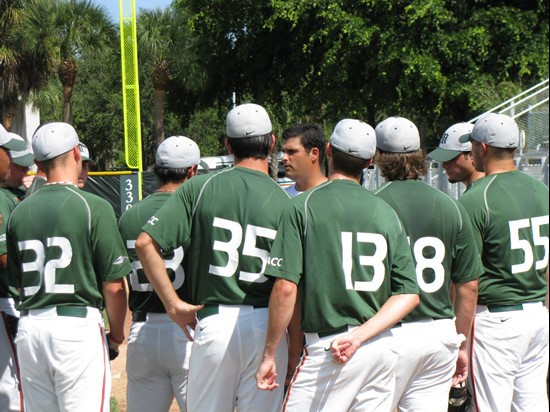 Associate head coach J.D. Arteage meeting with the pitching staff prior to Miami's first official fall practice on Oct. 15, 2009.