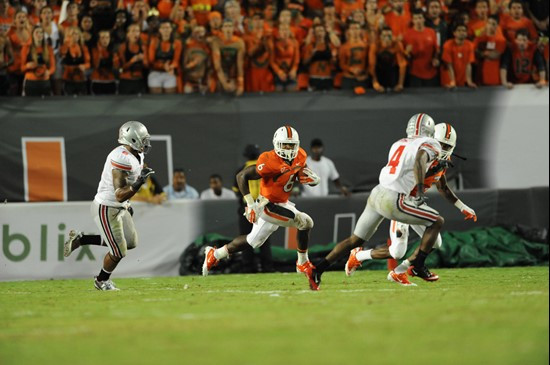 University of Miami Hurricanes running back Lamar Miller #6 ran for 188 yards in a game against the Ohio State Buckeyes at Sun Life Stadium on...