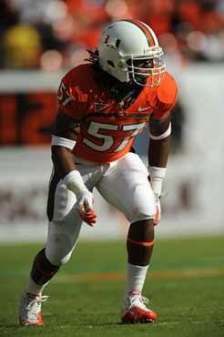 University of Miami Hurricanes linebacker Erik Lichter #57 plays in a game against the Georgia Tech Yellow Jackets at Sun Life Stadium on October 22,...