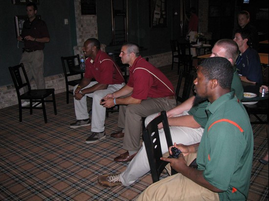 Jason Fox and Randy Phillips taking on Christian Ponder and Dekota Watson in NCAA 10 at the 2009 ACC Football Kickoff.