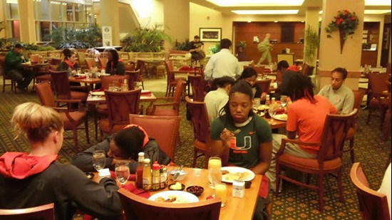 The team getting some breakfast at the hotel