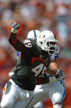 University of Miami defensive end Courtney Harris #49 gets set to rush in a game against the Duke University Blue Devils at the Orange Bowl on...