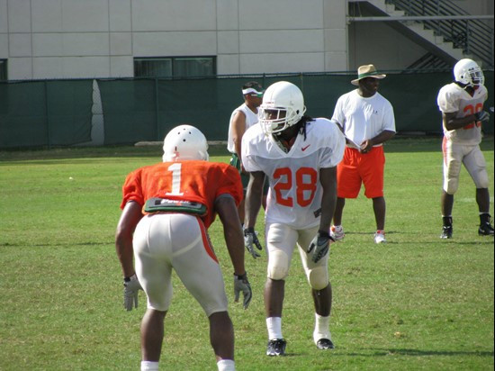 Brandon Harris (1) and Thearon Collier (28) at practice Wednesday morning at the Greentree Practice Fields.