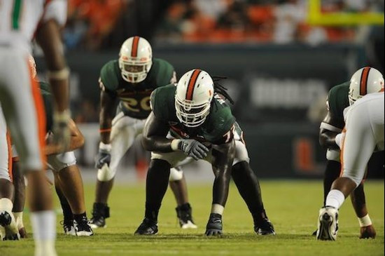 University of Miami Hurricanes offensive lineman Brandon Washington #72 gets set to block against the Florida A&M Rattlers at Land Shark Stadium on...