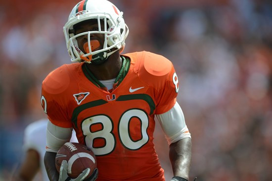 University of Miami Hurricanes wide receiver Rashawn Scott #80 catches a pass in a game against the North Carolina State Wolfpack at Sun Life Stadium...