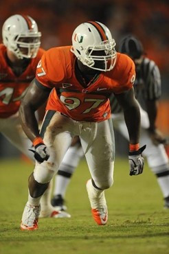 University of Miami Hurricanes defensive lineman Adewale Ojomo #97 plays in a game against the FAMU Rattlers at Sun Life Stadium on September 2, 2010....