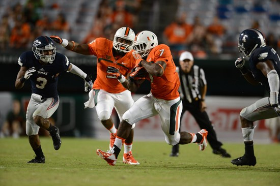 Gus Edwards #7 and the University of Miami Hurricanes defeated the Florida Atlantic Owls at Sun Life Stadium by a final score of 34-6 on August 30,...