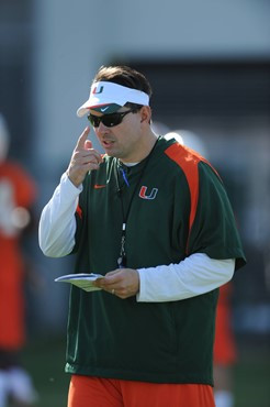 University of Miami Head Coach, Al Golden, instructs his team on how he wants them to execute his game plan during a spring practice at Greentree...