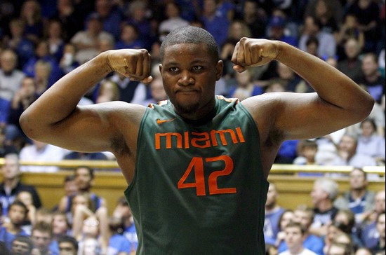 Miami's Reggie Johnson (42) reacts following a basket against Duke during the second half of an NCAA college basketball game in Durham, N.C., Sunday,...