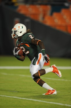 University of Miami Hurricanes running back Graig Cooper #2 carries the ball in a game against the North Carolina Tar Heels at Sun Life Stadium on...