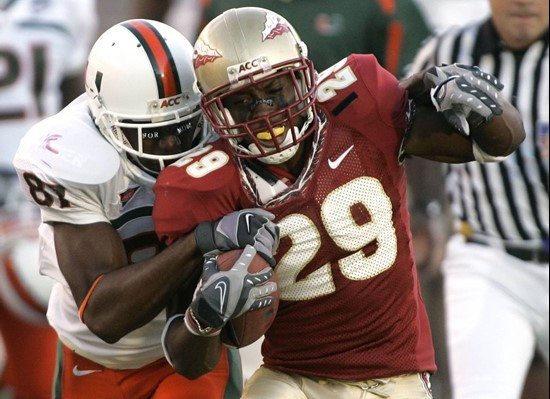 Florida State's Michael Ray Garvin, left, is tackled by Miami's Khalil Jones on a third quarter kickoff return. (AP Photo/Phil Coale)