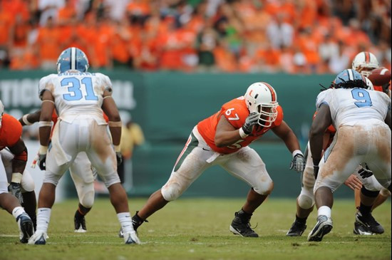 University of Miami Hurricanes offensive lineman Tyrone Byrd #67 gets set to block in a game against the North Carolina Tar Heels at Dolphin Stadium...