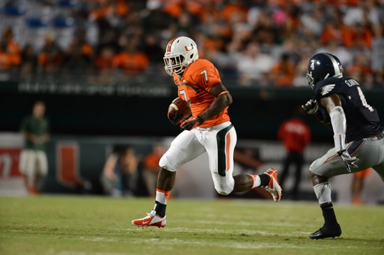 Gus Edwards #7 and the University of Miami Hurricanes defeated the Florida Atlantic Owls at Sun Life Stadium by a final score of 34-6 on August 30,...