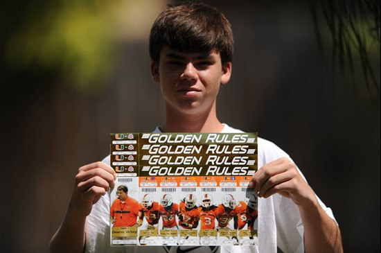 University of Miami Hurricane fan Matthew Murphy shows off his &Atilde;&cent;GOLDEN RULES&Atilde;&cent; tickets before the...