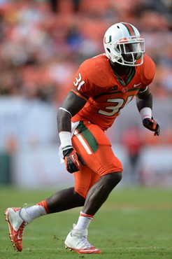 University of Miami Hurricanes linebacker Tyrone Cornileus #31 plays in a game against the Virginia Cavaliers at Sun Life Stadium on November 23,...