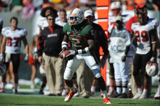 University of Miami Hurricanes running back Graig Cooper #2 carries the ball in a game against the Maryland Terrapins at Sun Life Stadium on November...