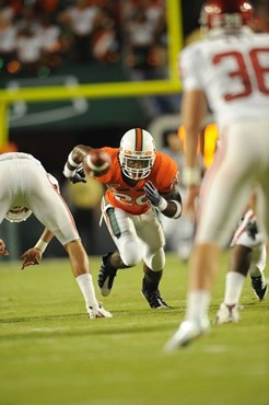 University of Miami Hurricanes running back Damien Berry #20 rushes the punter in a game against the Oklahoma Sooners at Land Shark Stadium on October...