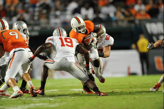 University of Miami Hurricanes running back Mike James #5 carries the ball against the Ohio State Buckeyes at Sun Life Stadium on September 17, 2011. ...