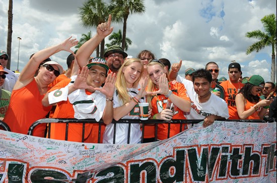 Fans wait for the Hurricanes forming a human tunnel at SunLife Stadium before a game against the Kansas State Wildcats on September 24, 2011.  Photo...
