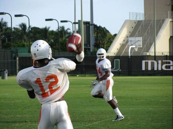 Jacory Harris (12) and Richard Gordon (84) at practice Monday morning at the Greentree Practice Fields.