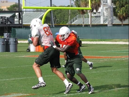 Jimmy Graham (L) and C.J. Holton (R) at practice Monday morning on the Greentree Practice Fields.