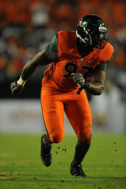 University of Miami Hurricanes defensive lineman Adewale Ojomo #97 plays in a game against the Virginia Tech Hokies at Sun Life Stadium on November...