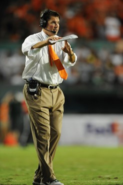 University of Miami Hurricanes head coach Al Golden calls in a play in a game against the Ohio State Buckeyes at Sun Life Stadium on September 17,...