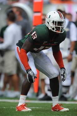 University of Miami Hurricanes defensive back Ryan Hill #13 plays in a game against the University of South Florida Bulls at Sun Life Stadium on...
