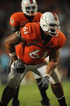 University of Miami Hurricanes offensive lineman Joel Fiqueroa #61 plays in a game against the Georgia Tech Yellow Jackets at Land Shark Stadium on...