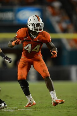 University of Miami Hurricanes linebacker Eddie Johnson #44 plays in a game against the Virginia Tech Hokies at Sun Life Stadium on November 1, 2012....