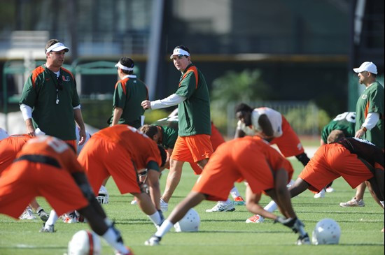 University of Miami Head Coach, Al Golden, instructs his team on how he wants them to execute his game plan during a spring practice at Greentree...