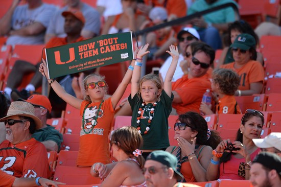University of Miami Hurricane fans show their team spirit in a game against the Cincinnati Bearcats at Sun Life Stadium on October 11, 2014.  Photo by...