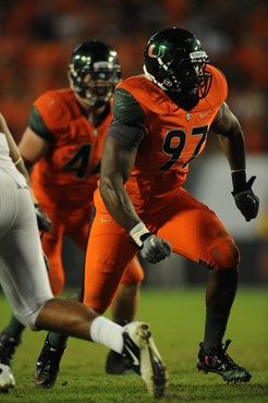 University of Miami Hurricanes defensive lineman Adewale Ojomo #97 plays in a game against the Virginia Tech Hokies at Sun Life Stadium on November...