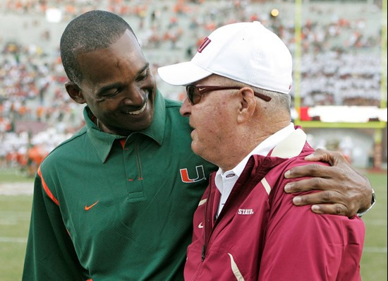 Miami coach Randy Shannon, left, and Florida State coach Bobby Bowden meet prior to their teams' NCAA college football game Monday, Sept. 7, 2009, in...
