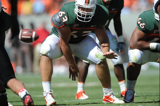 University of Miami Hurricanes offensive lineman Tyler Horn #63 plays in a game against the Maryland Terrapins at Sun Life Stadium on November 6,...