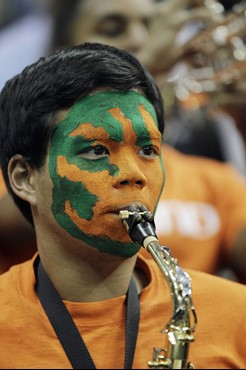 A Miami band member plays during the first half of an NCAA college basketball game against Florida State in the quarterfinals of the Atlantic Coast...