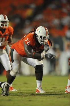University of Miami Hurricanes offensive lineman Brandon Washington #72 gets set to block against the FAMU Rattlers at Sun Life Stadium on September...