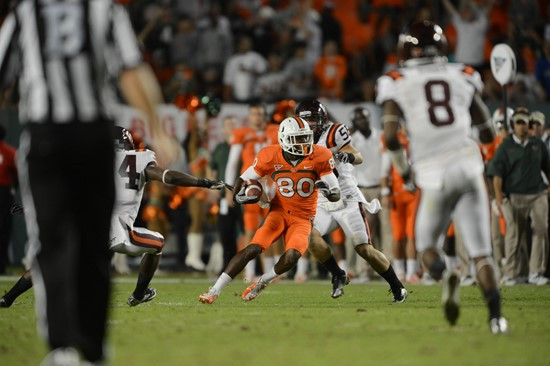 University of Miami Hurricanes wide receiver Rashawn Scott #80 plays in a game against the Virginia Tech Hokies at Sun Life Stadium on November 1,...