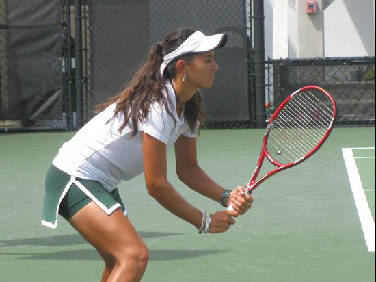 Kayla Rizzolo awaiting serve Saturday at the Neil Schiff Tennis Center.