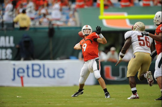 University of Miami Hurricanes quarterback Robert Marve #9 prepares for a long pass in a game against The Florida State Seminoles at Dolphin Stadium...