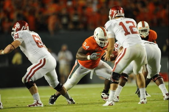 University of Miami Hurricanes defensive lineman Micanor Reqis #54 plays in a game against the Oklahoma Sooners at Land Shark Stadium on October 3,...
