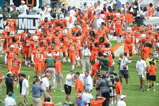 The University of Miami Hurricanes celebrate after upsetting the #12 ranked University of Florida Gators by a final score of 21-16 at Sun Life Stadium...