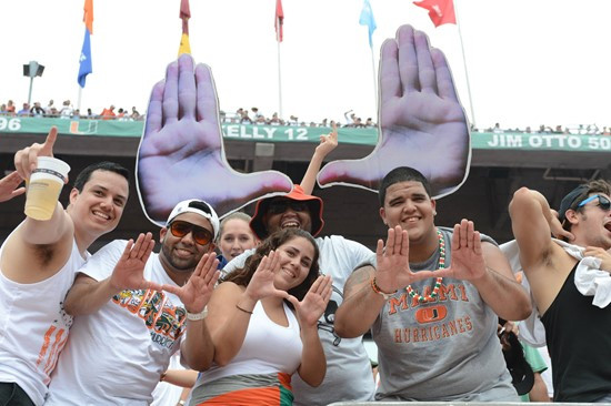 University of Miami Hurricane fans show their team spirit in a game against the #12 ranked University of Florida Gators at Sun Life Stadium on...