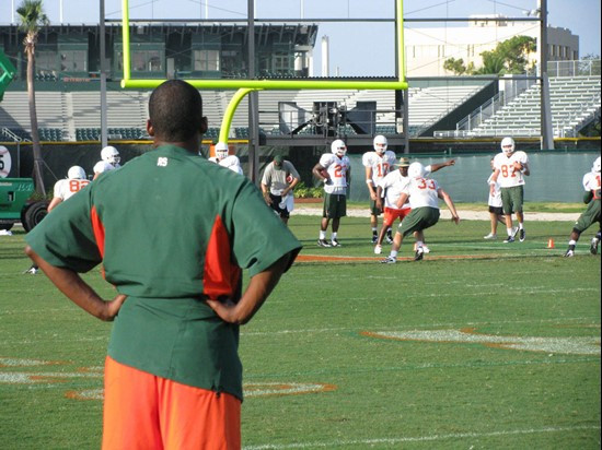 Randy Shannon looks on at practice Monday morning on the Greentree Practice Fields.