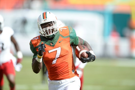 University of Miami Hurricanes running back Gus Edwards #7 and the Canes take on the Cincinnati Bearcats at Sun Life Stadium on October 11, 2014. ...