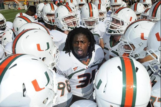 Sean Spence in the team huddle - 2011 Miami Hurricanes Football @ Virginia Tech
