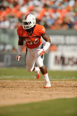 University of Miami Hurricanes linebacker Marcus Robinson #56 plays in a game against the Bethune Cookman Wildcats at Sun Life Stadium on October 1,...